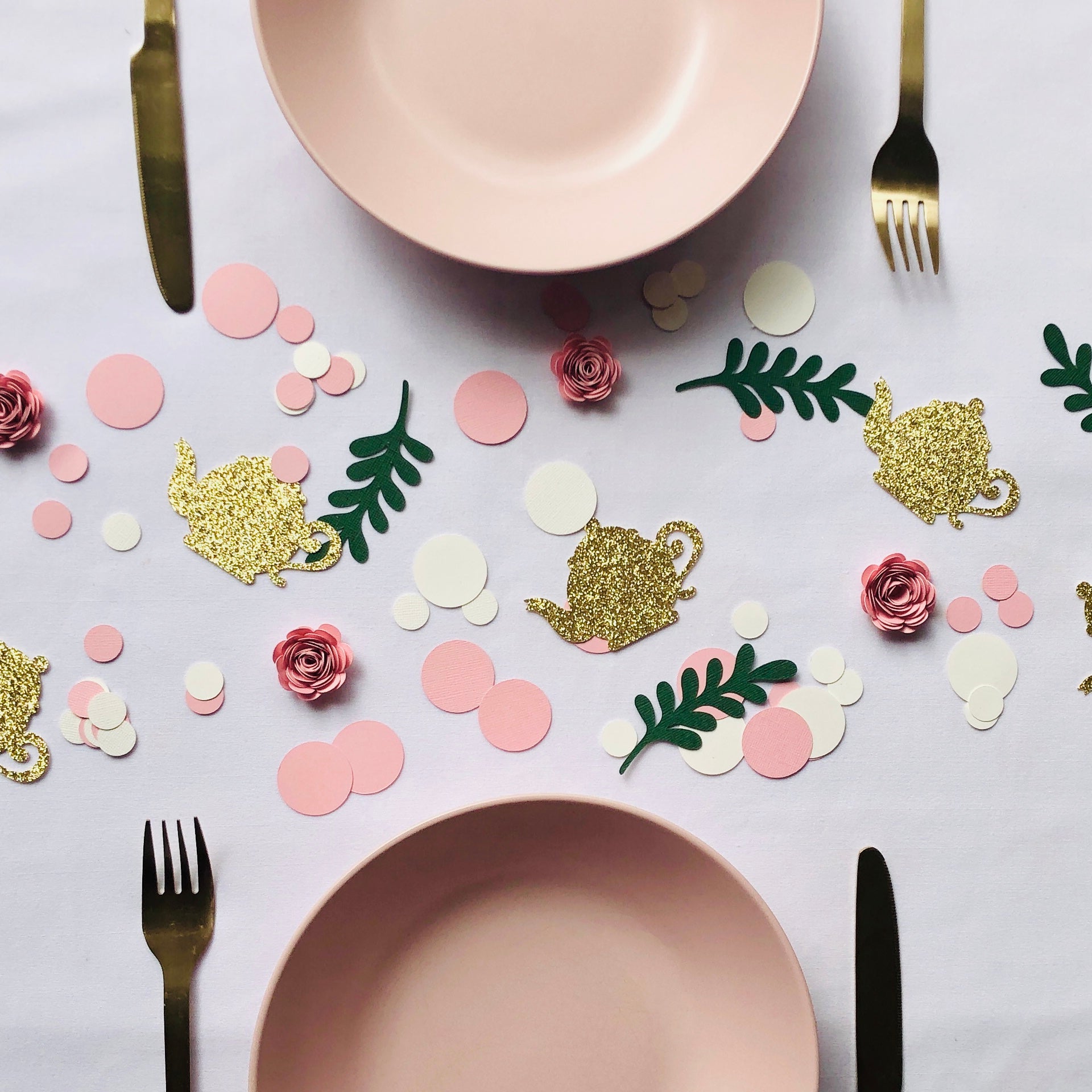 Green leaves pink flowers gold teapots pink and white circle confetti