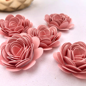 pink paper flower party supplies